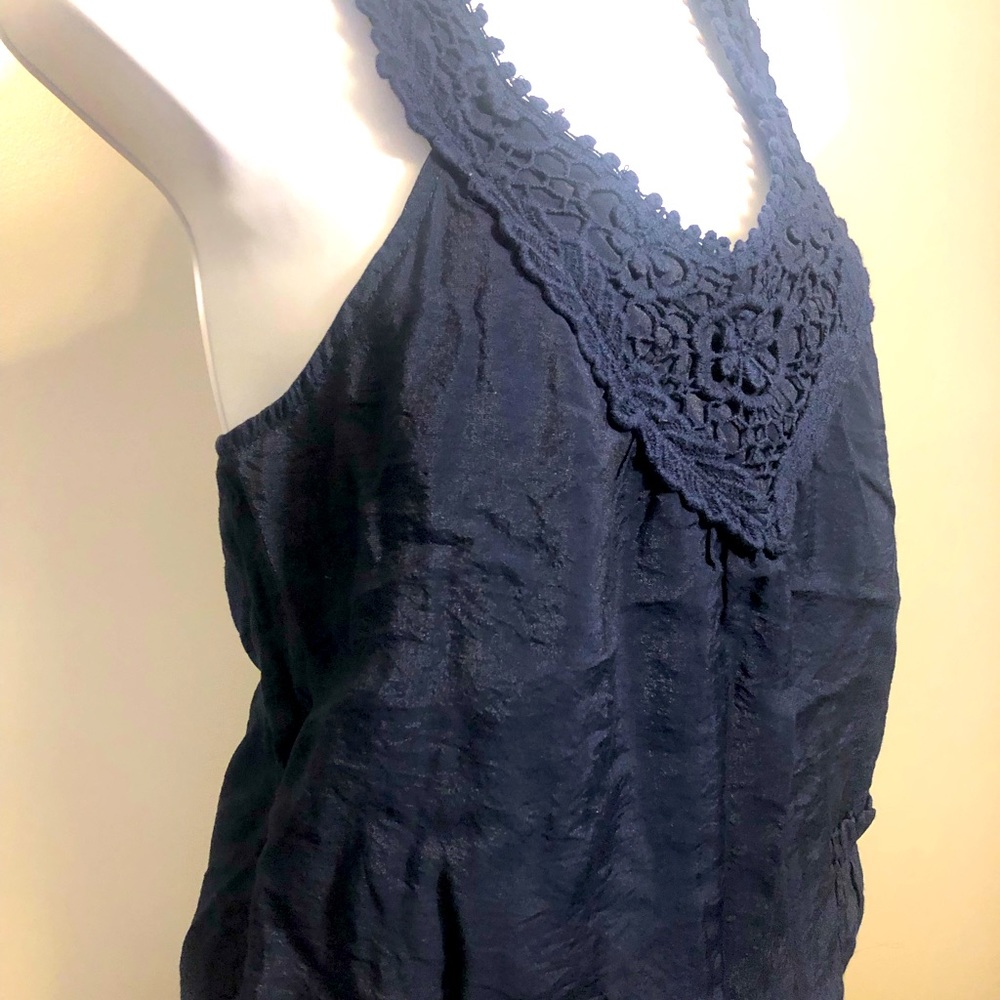 Forever 21. Navy blue tank with embroidery around the neckline.